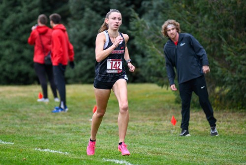 Acacia Barber runs in a cross country race.