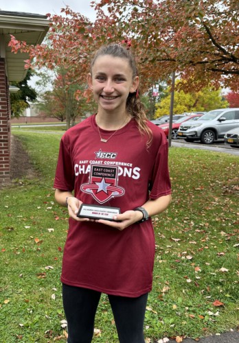 Acacia Barber after being named the East Coast Conference Runner of the Year following the conference championships last month.