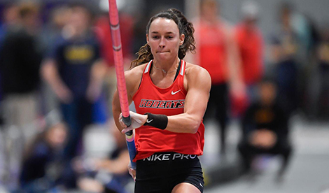 Brynn King runs at beginning of pole vault attempt.