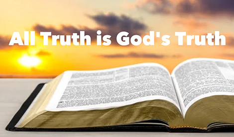 A Bible lays open in front of a sky at sunset. The words All Truth is God's Truth overlay the photo.