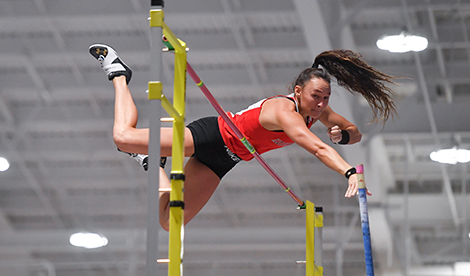 Brynn King clears the bar in her pole vault attempt.