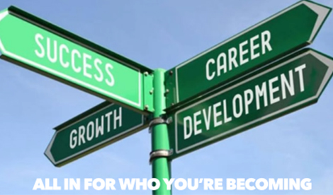 Street signs that say success, growth, and career development with the words All in for Who You're Becoming below