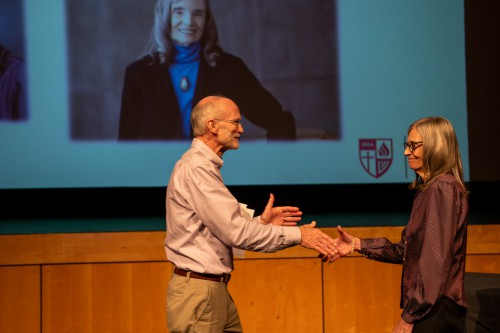 Elvera Berry and Doug Cullum shake hands