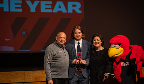 Gunner MacMillan, Bob Segave, President Porterfield, and Reggie