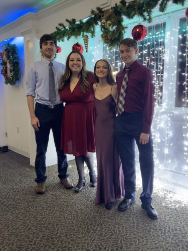 Hannah with her boyfriend and 2 friends at formal.