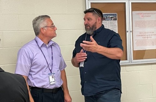 James Blake (right) sharing information about the program