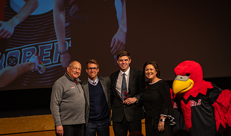 Ryan Karker, Andrew Dorr, Bob Segave, President Porterfield, and Reggie