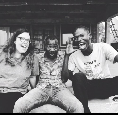 Shaw and 2 college students in Uganda