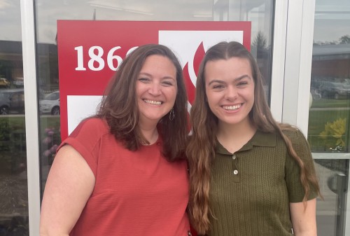 Sherry and Gabby smile