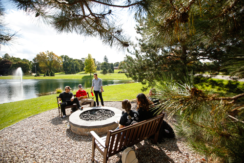 Students by Roberts Pond