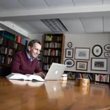 Professor David Carr reads books